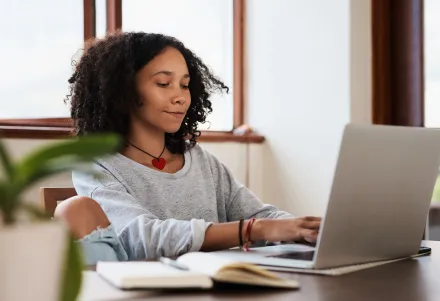 Preparing Students for a College Experience Shaped by AI